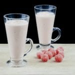 Watermelon and pineapple smoothie! So tasty and just 4 ingredients! Watermelon, pineapple, Greek yoghurt, and ice. 1% fat and less than 200 calories! Yum! | theyumyumclub.com