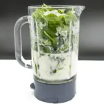 Avocado and spinach detox smoothie. But why detox? Because of the superfoods of ginger and chia seeds! All washed down with almond milk and honey. Yum! | theyumyumclub.com