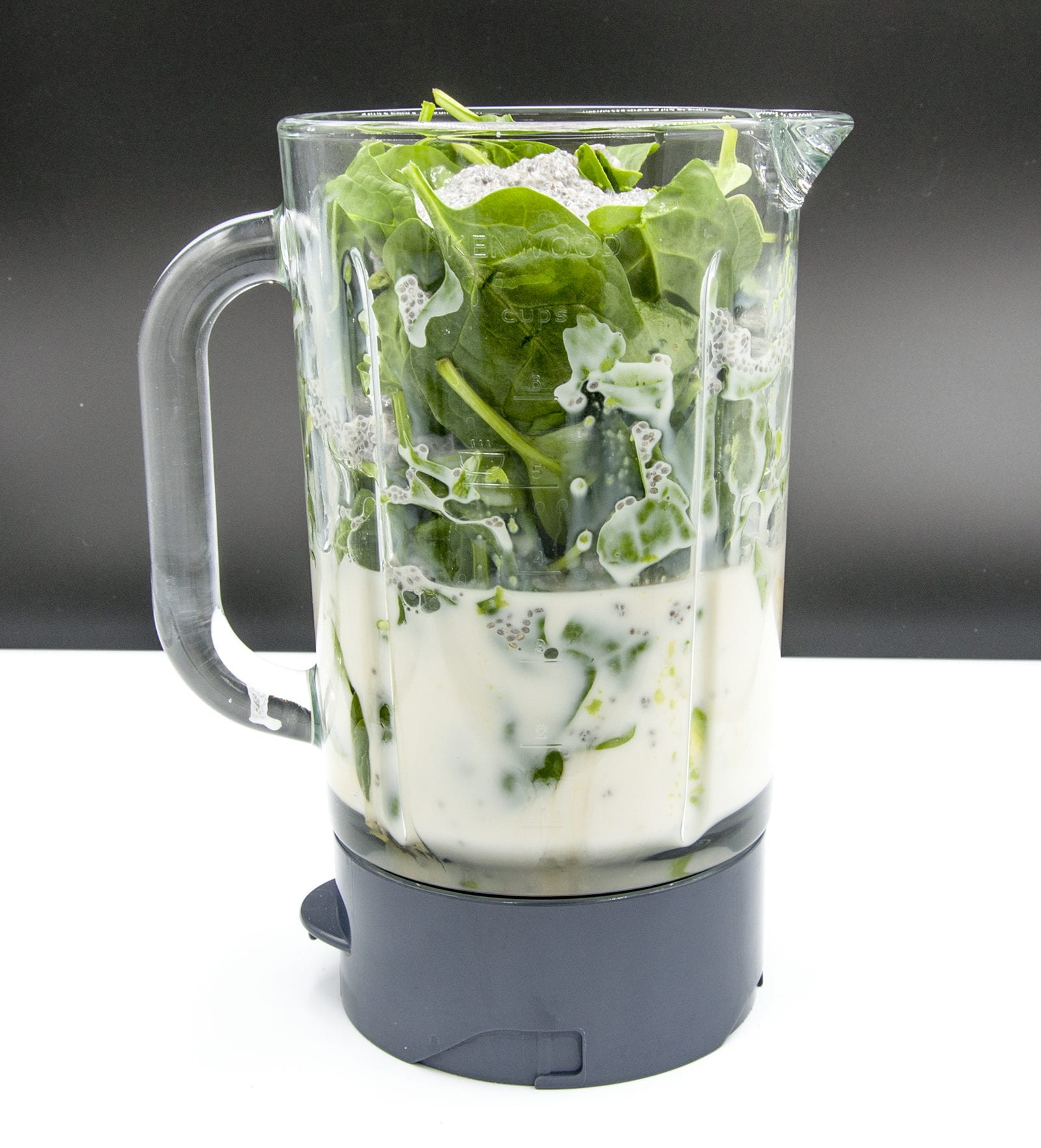 Avocado and spinach detox smoothie. But why detox? Because of the superfoods of ginger and chia seeds! All washed down with almond milk and honey. Yum! | theyumyumclub.com