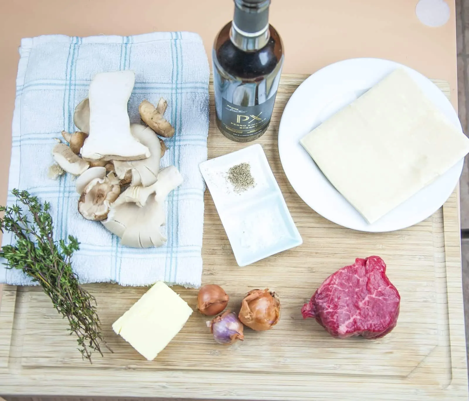 This individual beef wellington recipe is a yummy treat for one or more. Beef tenderloin, rich duxelle, and flakey puff pastry. Decadence at is best ???? | theyumyumclub.com