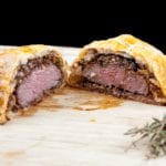 This individual beef wellington recipe is a yummy treat for one or more. Beef tenderloin, rich duxelle, and flakey puff pastry. Decadence at is best ???? | theyumyumclub.com