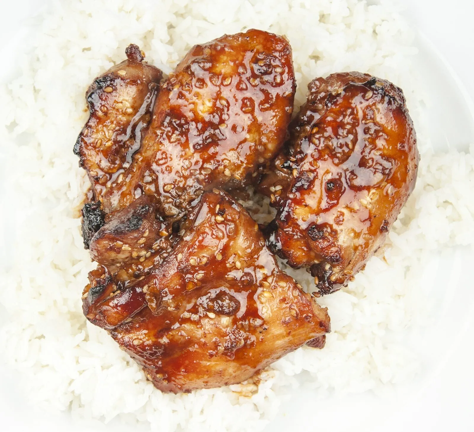 Roasted Chinese chicken thighs with a sticky caramelised glaze