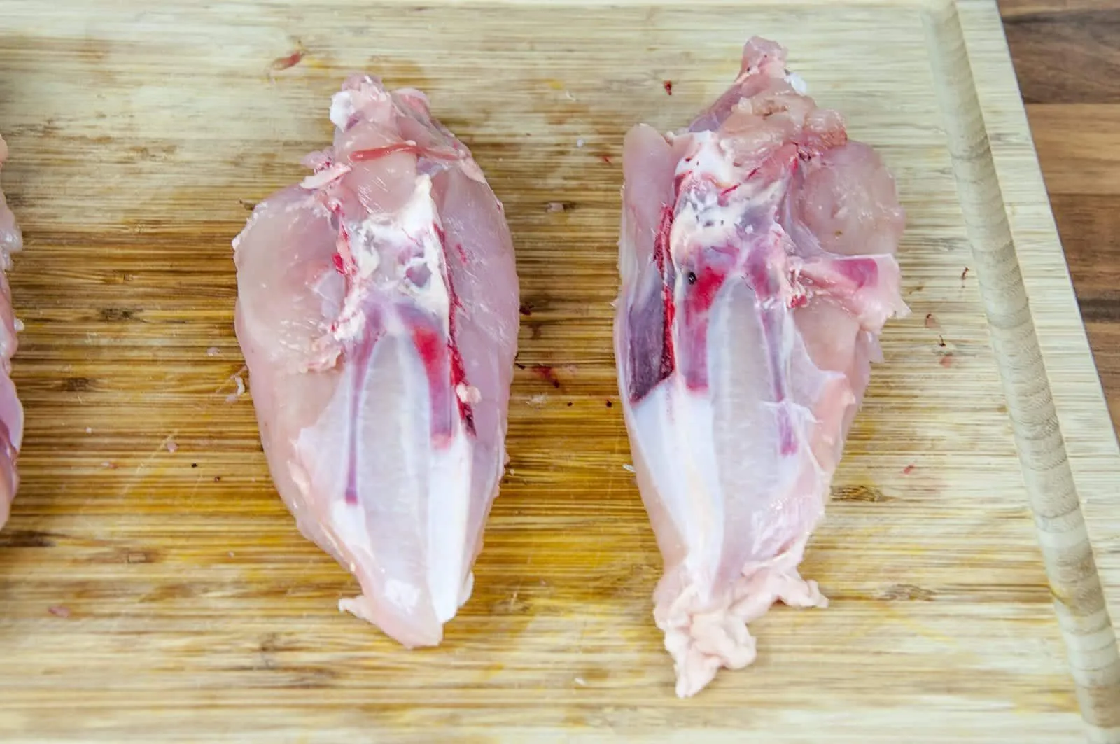 Classic coq au vin. A wonderfully rustic French casserole of chicken in red wine. Simple to make and very tasty. A great recipe for all of the family. Yum! | theyumyumclub.com