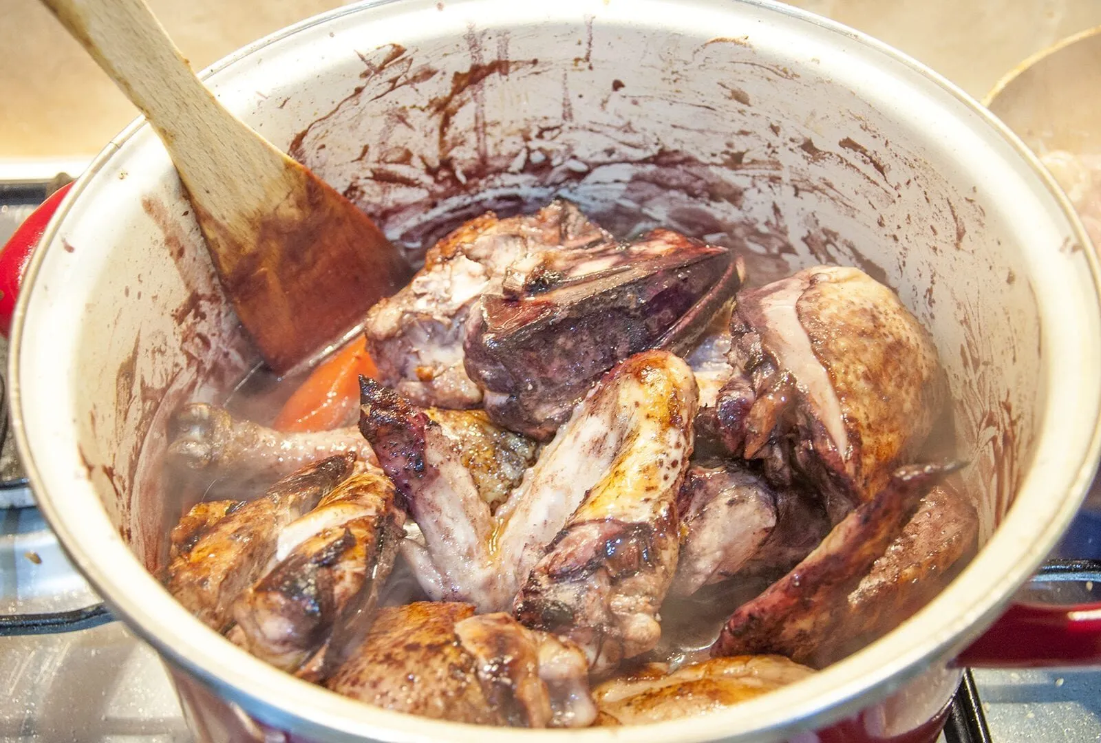 Classic coq au vin. A wonderfully rustic French casserole of chicken in red wine. Simple to make and very tasty. A great recipe for all of the family. Yum! | theyumyumclub.com