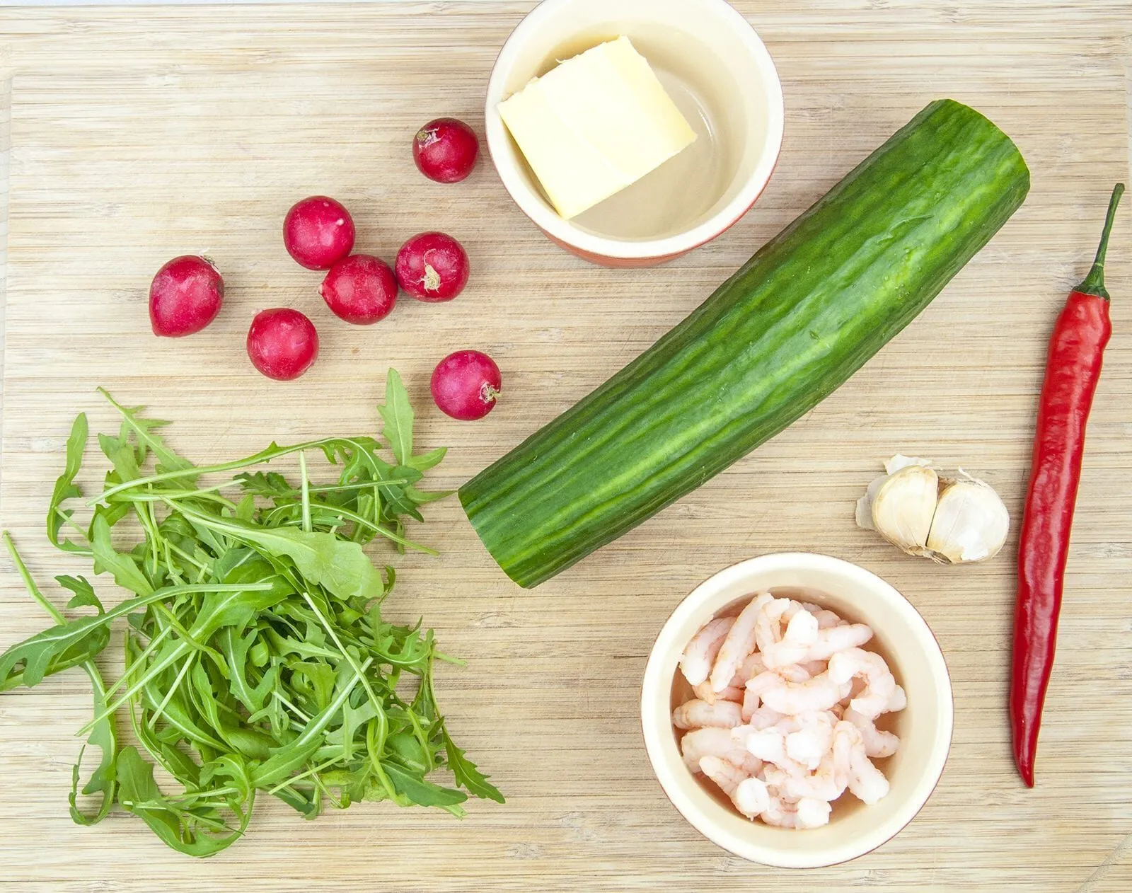 Cucumber potted shrimp. Serve as a delicious appetizer for your dinner party or as a simple nibble as your guests arrive. Shrimp, garlic and chilli all served in fresh cucumber. Yum! | theyumyumclub.com