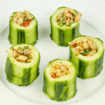 Cucumber potted shrimp. Serve as a delicious appetizer for your dinner party or as a simple nibble as your guests arrive. Shrimp, garlic and chilli all served in fresh cucumber. Yum! | theyumyumclub.com