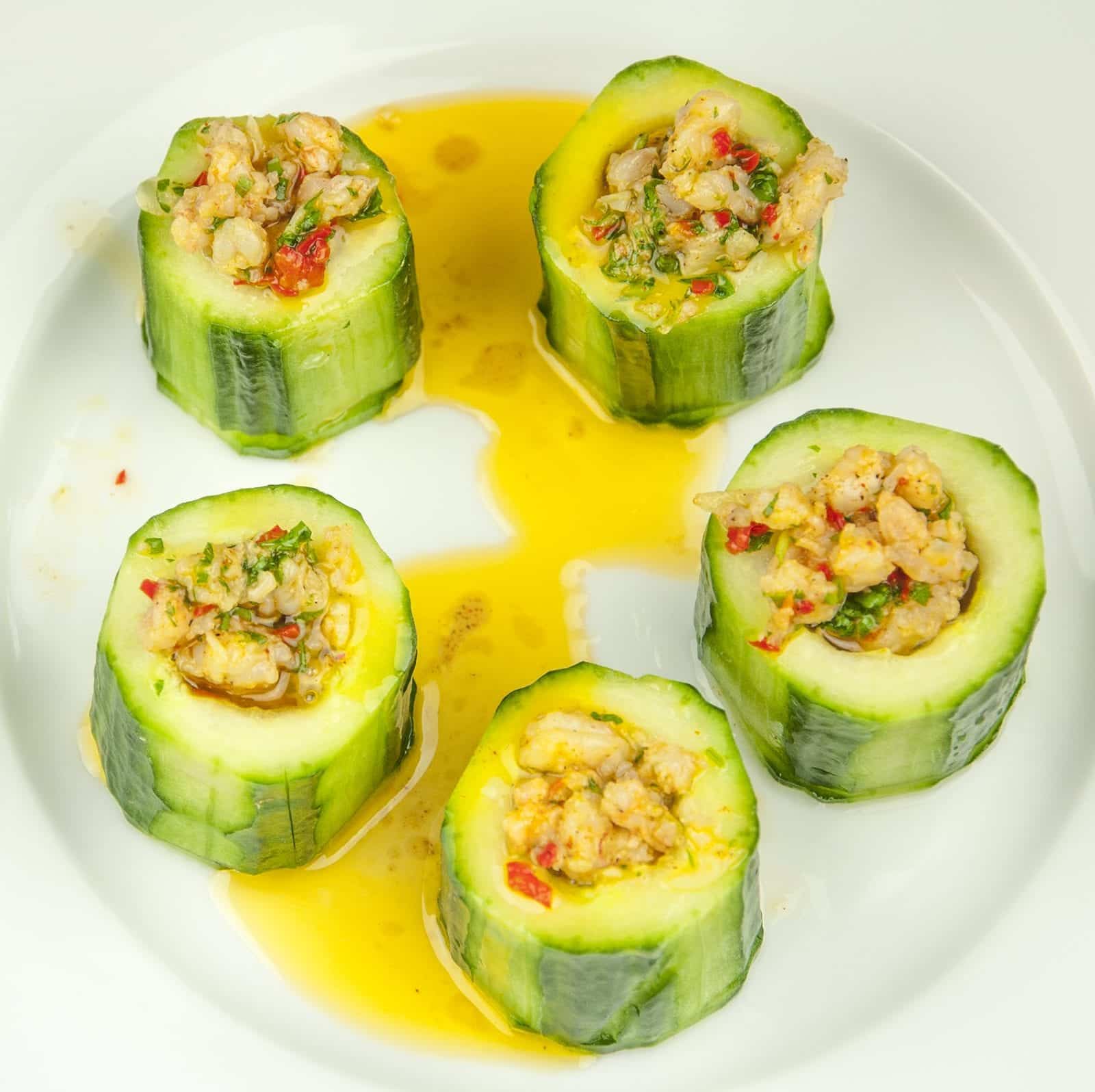 Cucumber potted shrimp. Serve as a delicious appetizer for your dinner party or as a simple nibble as your guests arrive. Shrimp, garlic and chilli all served in fresh cucumber. Yum! | theyumyumclub.com