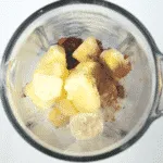Raspberry and pineapple smoothie, with a little surprise! Banana to add texture and a wonderful hint of cinnamon to taste. A great start to the day. Yum! | theyumyumclub.com