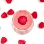 Raspberry and pineapple smoothie, with a little surprise! Banana to add texture and a wonderful hint of cinnamon to taste. A great start to the day. Yum! | theyumyumclub.com