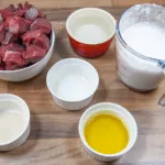 Malaysian beef rendang is a classic tasty South East Asian recipe. The sweet taste of coconut combined with chilli, ginger and eastern spices. Yum! | theyumyumclub.com