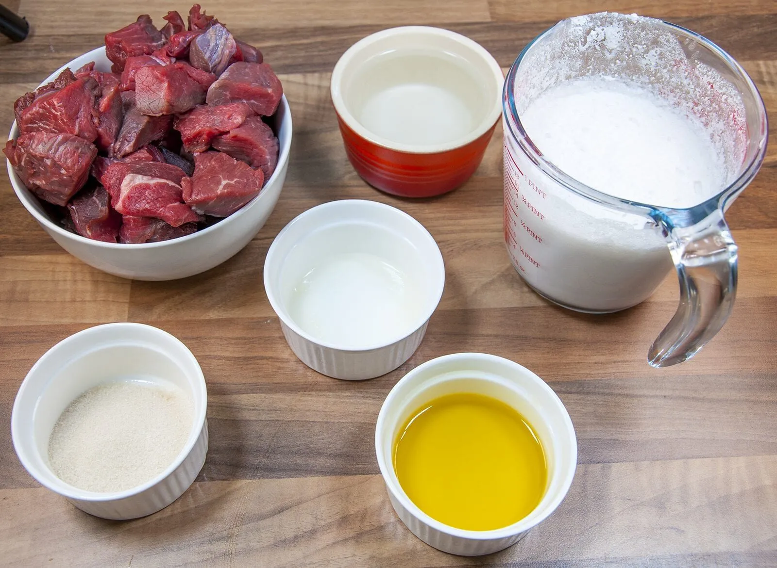 Malaysian beef rendang is a classic tasty South East Asian recipe. The sweet taste of coconut combined with chilli, ginger and eastern spices. Yum! | theyumyumclub.com