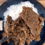Malaysian beef rendang is a classic tasty South East Asian recipe. The sweet taste of coconut combined with chilli, ginger and eastern spices. Yum! | theyumyumclub.com