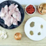Sweet pepper & lemon chicken cacciatore. An Italian take on a French classic. Chicken thighs cooked in traditional tomato and herb sauce. Yum! | theyumyumclub.com