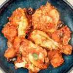 Sweet pepper & lemon chicken cacciatore. An Italian take on a French classic. Chicken thighs cooked in traditional tomato and herb sauce. Yum! | theyumyumclub.com