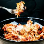 Sweet pepper & lemon chicken cacciatore. An Italian take on a French classic. Chicken thighs cooked in traditional tomato and herb sauce. Yum! | theyumyumclub.com