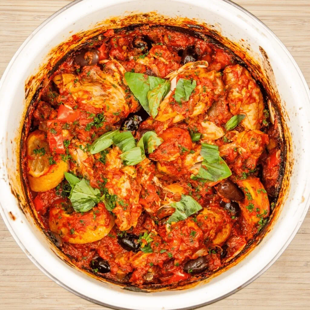 Sweet pepper & lemon chicken cacciatore. An Italian take on a French classic. Chicken thighs cooked in traditional tomato and herb sauce. Yum! | theyumyumclub.com