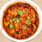 Sweet pepper & lemon chicken cacciatore. An Italian take on a French classic. Chicken thighs cooked in traditional tomato and herb sauce. Yum! | theyumyumclub.com