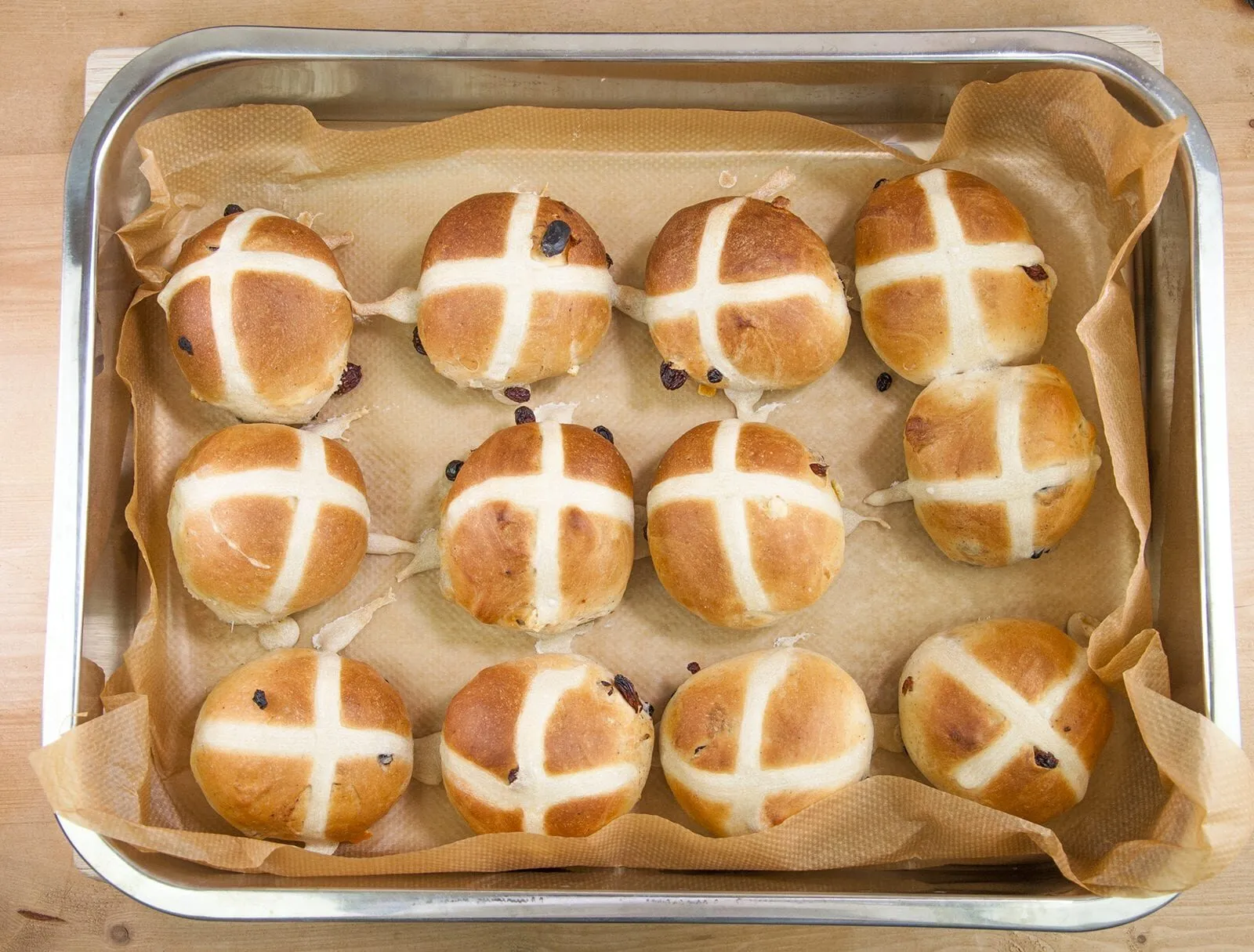 It's Easter so hot cross buns are on the menu!! What a joyous moment. Homemade hot cross buns. Simple to make and so delicious. Yum! Yum! | theyumyumclub.com