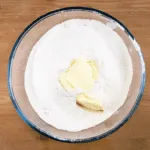 It's Easter so hot cross buns are on the menu!! What a joyous moment. Homemade hot cross buns. Simple to make and so delicious. Yum! Yum! | theyumyumclub.com