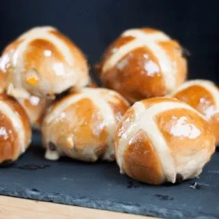 It's Easter so hot cross buns are on the menu!! What a joyous moment. Homemade hot cross buns. Simple to make and so delicious. Yum! Yum! | theyumyumclub.com