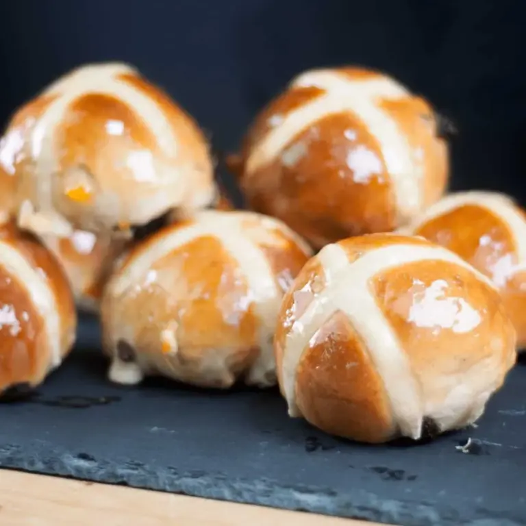It's Easter so hot cross buns are on the menu!! What a joyous moment. Homemade hot cross buns. Simple to make and so delicious. Yum! Yum! | theyumyumclub.com