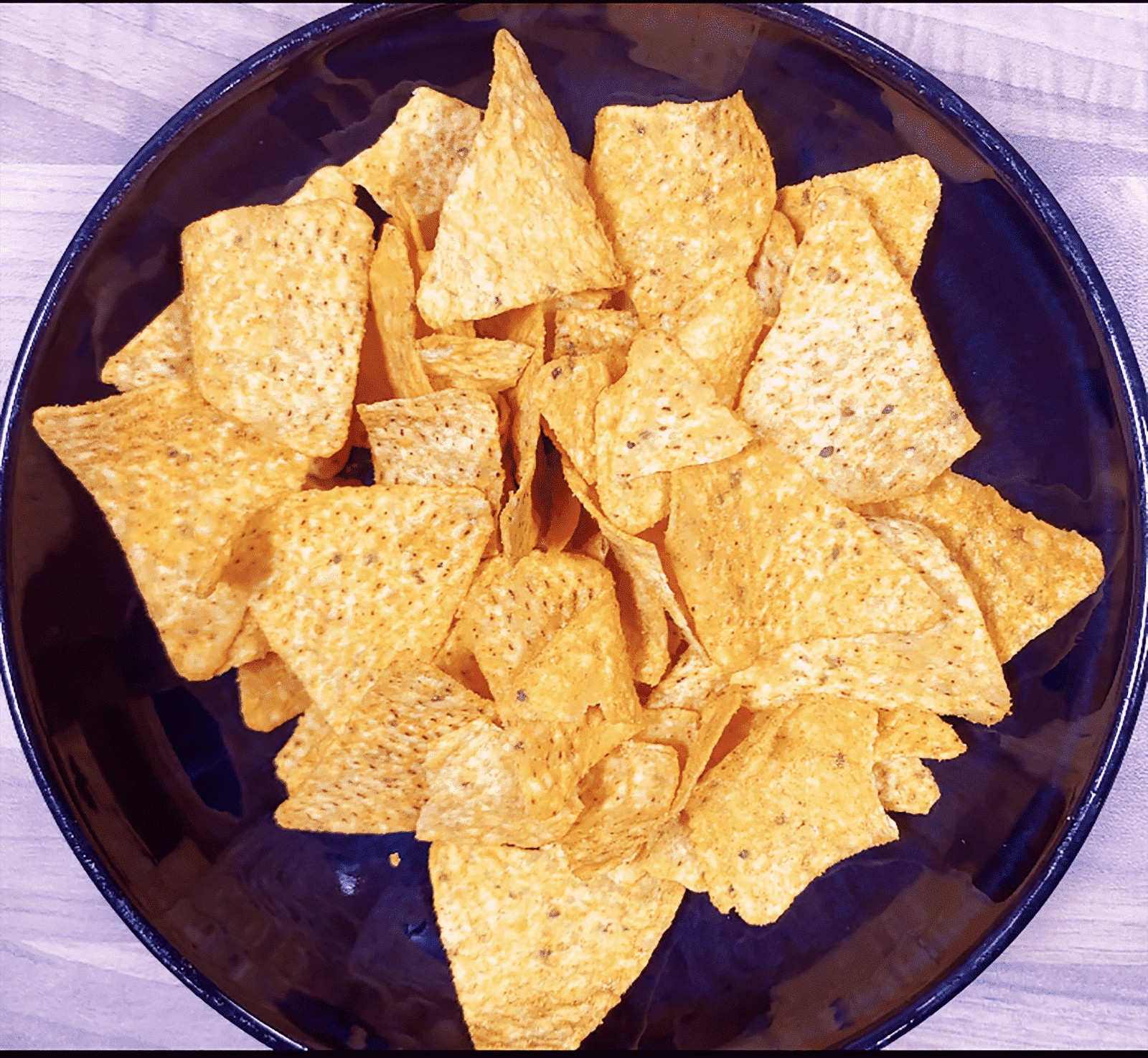 We all know pulled pork nachos but how about tangy pulled pork shoulder Doritos! Tangy cheese Doritos covered in spicy slow-cooked pork shoulder drowned in melted cheddar cheese. Yum! | theyumyumclub.com