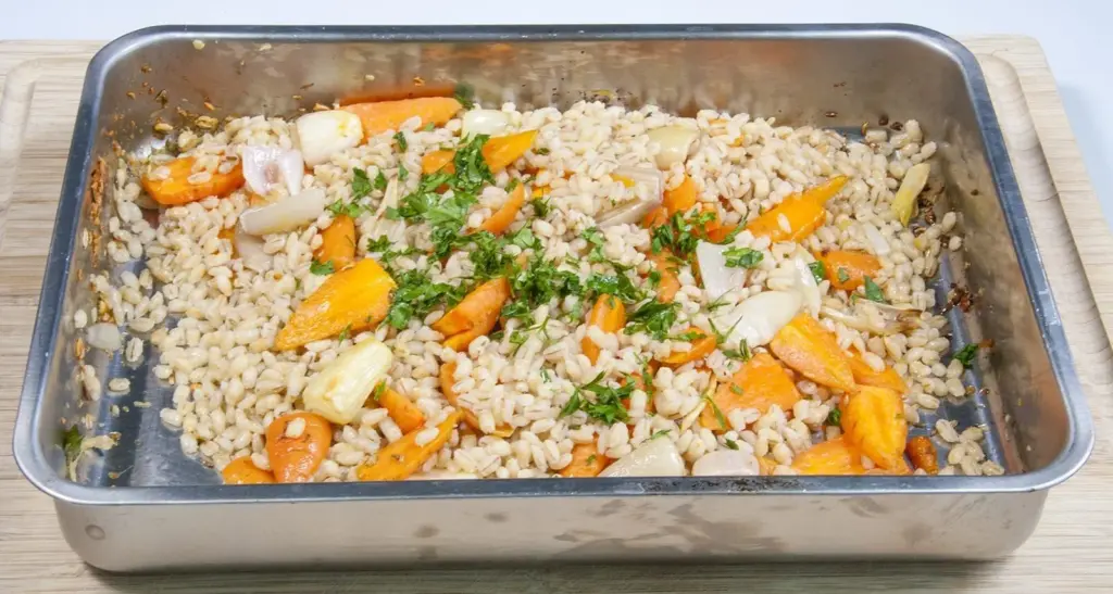 Add roughly chopped parsley to the salad | https://theyumyumclub.com/2019/04/22/braised-carrot-pearl-barley-salad