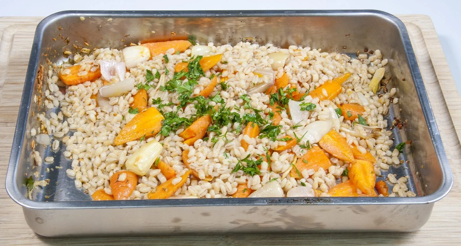 Add roughly chopped parsley to the salad | https://theyumyumclub.com/2019/04/22/braised-carrot-pearl-barley-salad