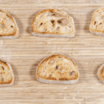 Toast the sourdough bread | https://theyumyumclub.com/2019/04/23/ricotta-prosciutto-fig-crostini/