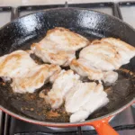 Creamy sherry and thyme chicken thighs. A wonderfully mouthwatering and delicious recipe. Add in wild mushrooms and you have one very special dish. Yum! | theyumyumclub.com