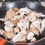 Creamy sherry and thyme chicken thighs. A wonderfully mouthwatering and delicious recipe. Add in wild mushrooms and you have one very special dish. Yum! | theyumyumclub.com