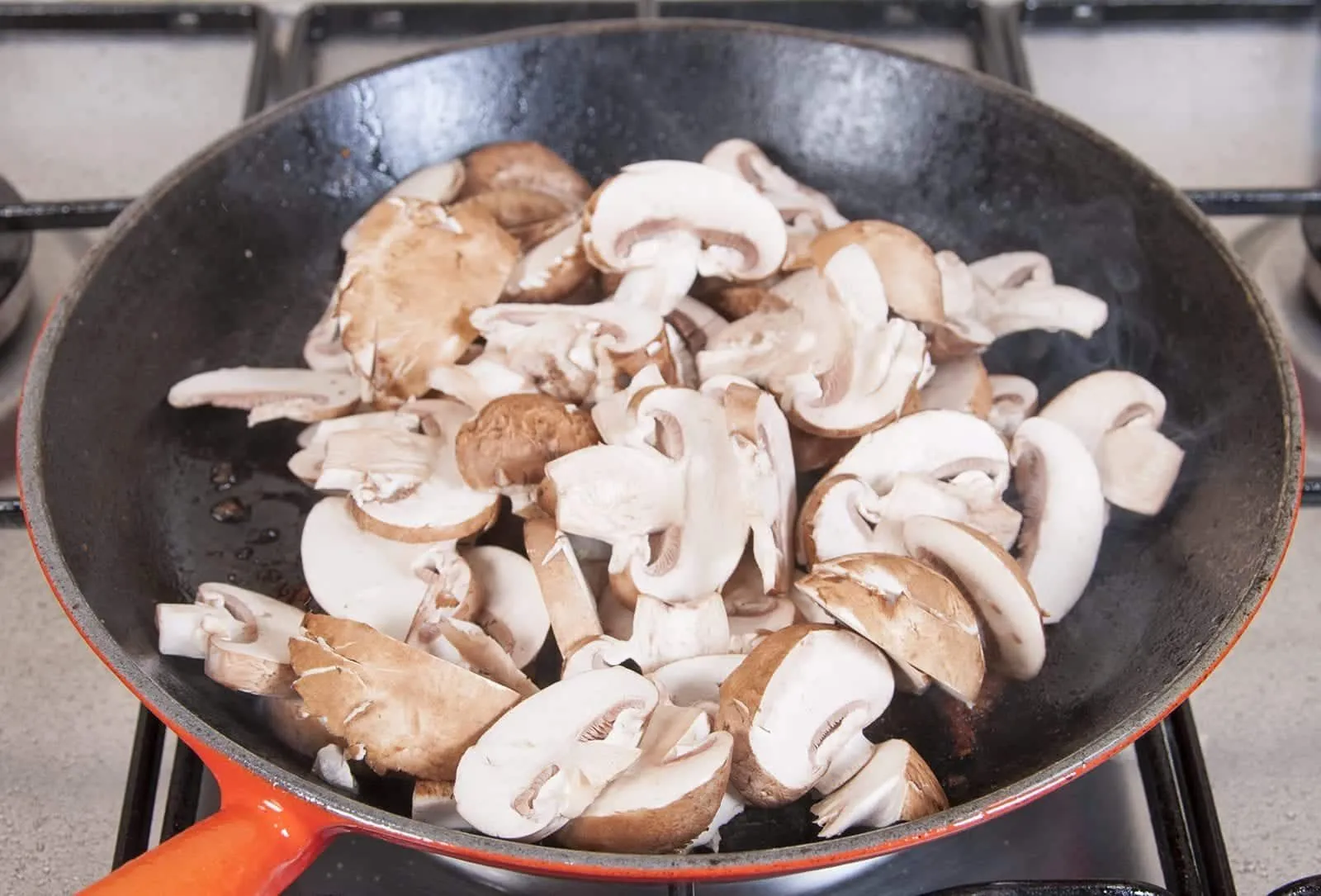 Creamy sherry and thyme chicken thighs. A wonderfully mouthwatering and delicious recipe. Add in wild mushrooms and you have one very special dish. Yum! | theyumyumclub.com