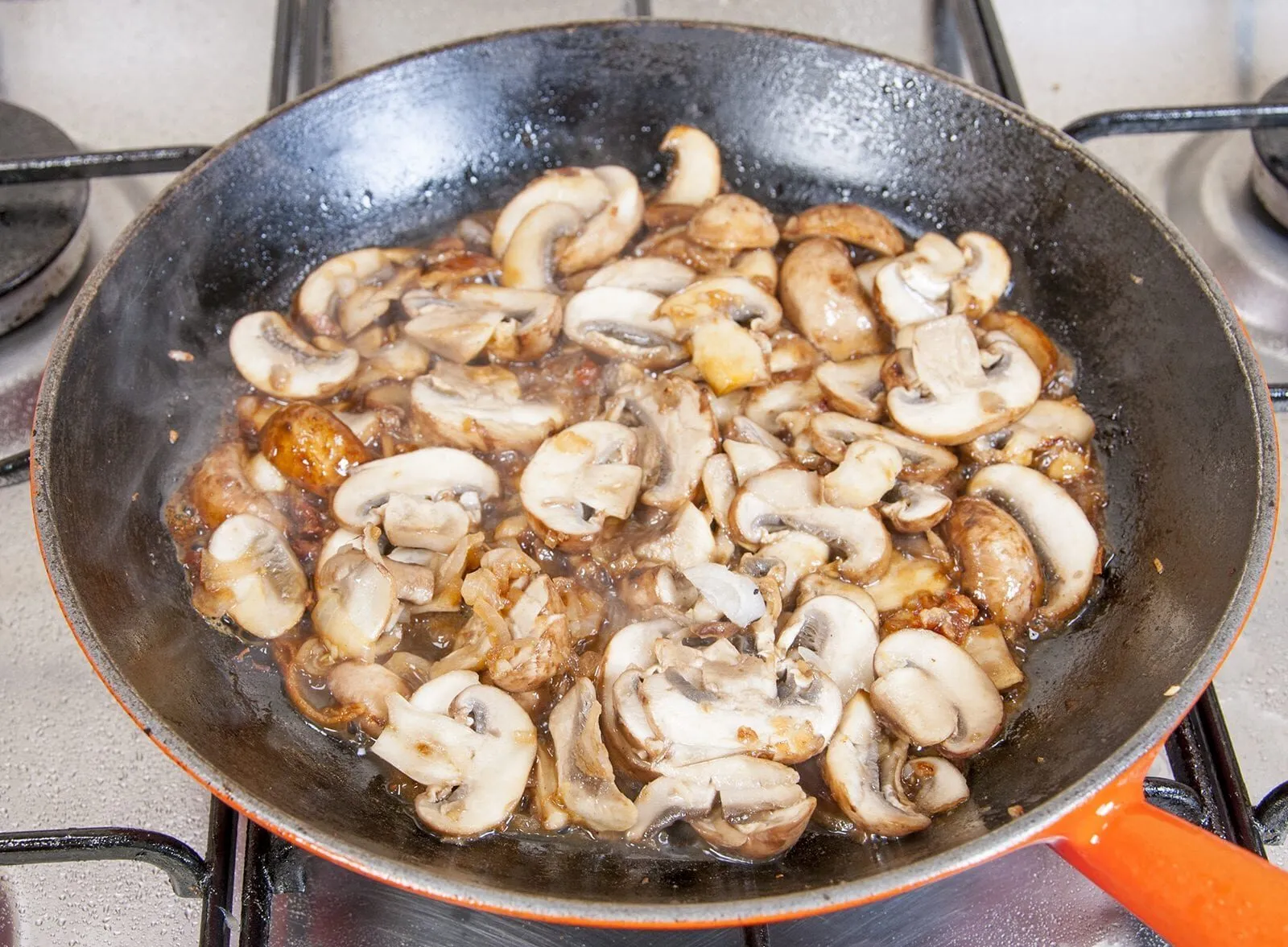 Creamy sherry and thyme chicken thighs. A wonderfully mouthwatering and delicious recipe. Add in wild mushrooms and you have one very special dish. Yum! | theyumyumclub.com