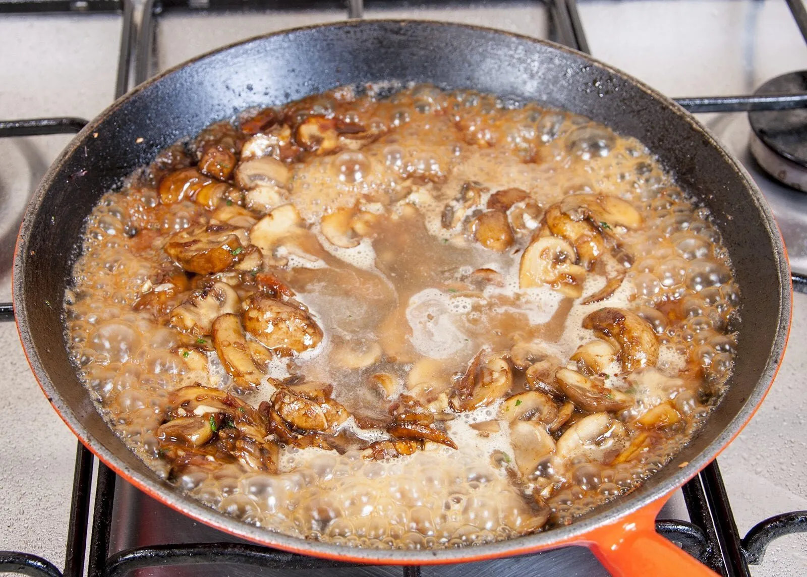 Creamy sherry and thyme chicken thighs. A wonderfully mouthwatering and delicious recipe. Add in wild mushrooms and you have one very special dish. Yum! | theyumyumclub.com