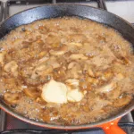Creamy sherry and thyme chicken thighs. A wonderfully mouthwatering and delicious recipe. Add in wild mushrooms and you have one very special dish. Yum! | theyumyumclub.com