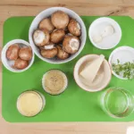 Creamy sherry and thyme chicken thighs. A wonderfully mouthwatering and delicious recipe. Add in wild mushrooms and you have one very special dish. Yum! | theyumyumclub.com