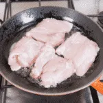 Creamy sherry and thyme chicken thighs. A wonderfully mouthwatering and delicious recipe. Add in wild mushrooms and you have one very special dish. Yum! | theyumyumclub.com