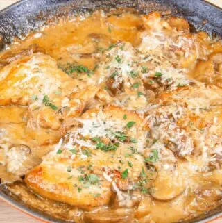 Creamy sherry and thyme chicken thighs. A wonderfully mouthwatering and delicious recipe. Add in wild mushrooms and you have one very special dish. Yum! | theyumyumclub.com