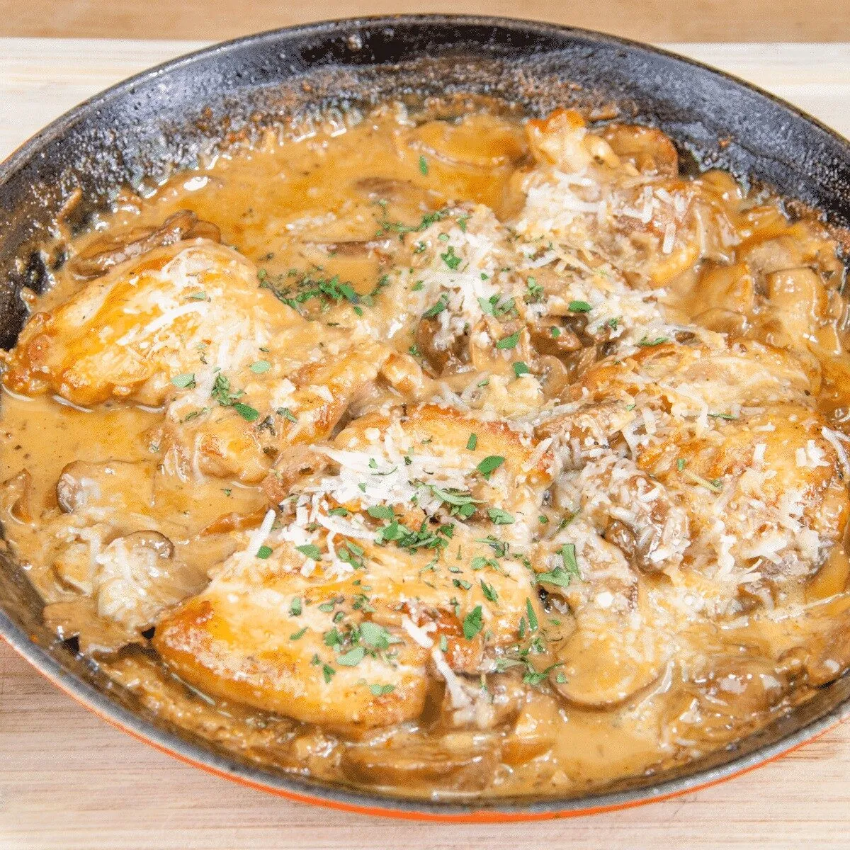 Creamy sherry and thyme chicken thighs. A wonderfully mouthwatering and delicious recipe. Add in wild mushrooms and you have one very special dish. Yum! | theyumyumclub.com