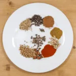 Aromatic spice-rubbed roast lamb Marrakesh style. 11 fragrant spices go into this scrummy recipe. The aroma of a Marrakesh Bazaar in your own kitchen. Yum! | theyumyumclub.com