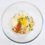 Parmesan & Paprika Haddock Baked in Garlic Butter. Add the crust ingredients to a mixing bowl | https://theyumyumclub.com/2019/04/29/parmesan-paprika-haddock-garlic-butter/