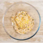 Parmesan & Paprika Haddock Baked in Garlic Butter. Cover the haddock | https://theyumyumclub.com/2019/04/29/parmesan-paprika-haddock-garlic-butter/