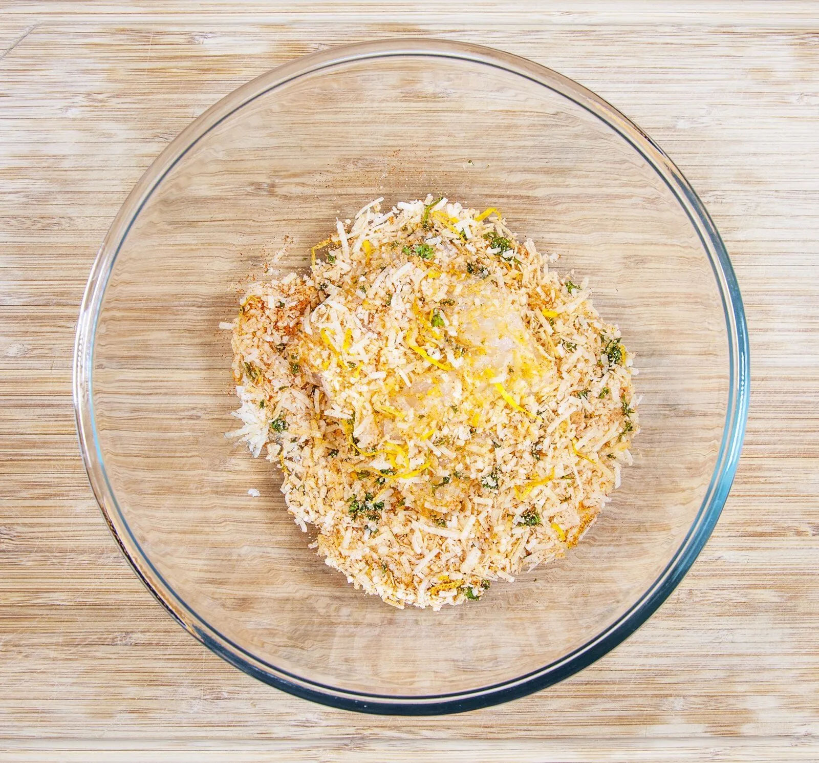 Parmesan & Paprika Haddock Baked in Garlic Butter. Cover the haddock | https://theyumyumclub.com/2019/04/29/parmesan-paprika-haddock-garlic-butter/