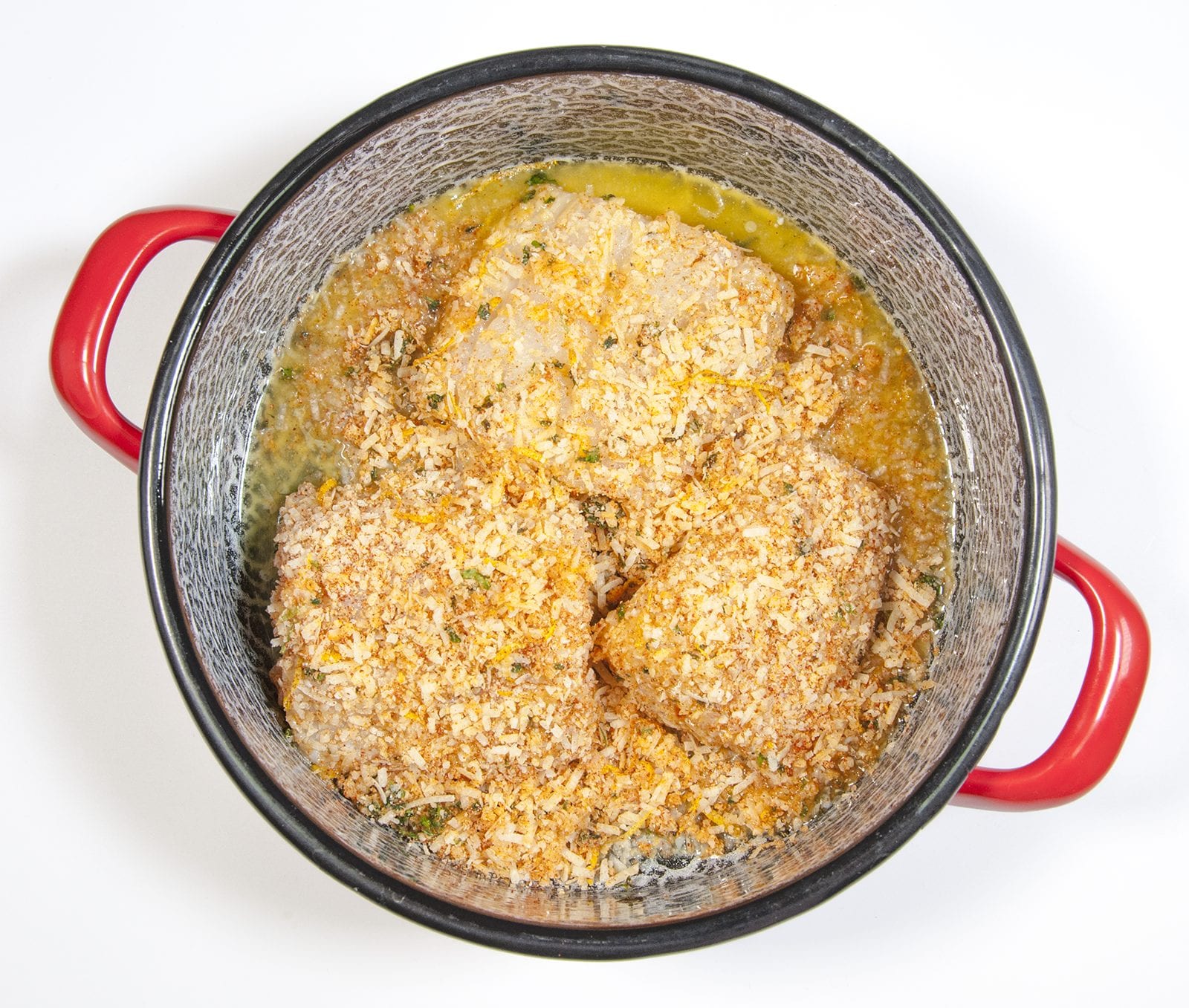 Parmesan & Paprika Haddock Baked in Garlic Butter. Add the remaining butter | https://theyumyumclub.com/2019/04/29/parmesan-paprika-haddock-garlic-butter/