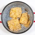 Parmesan & Paprika Haddock Baked in Garlic Butter. Place in roasting pot | https://theyumyumclub.com/2019/04/29/parmesan-paprika-haddock-garlic-butter/