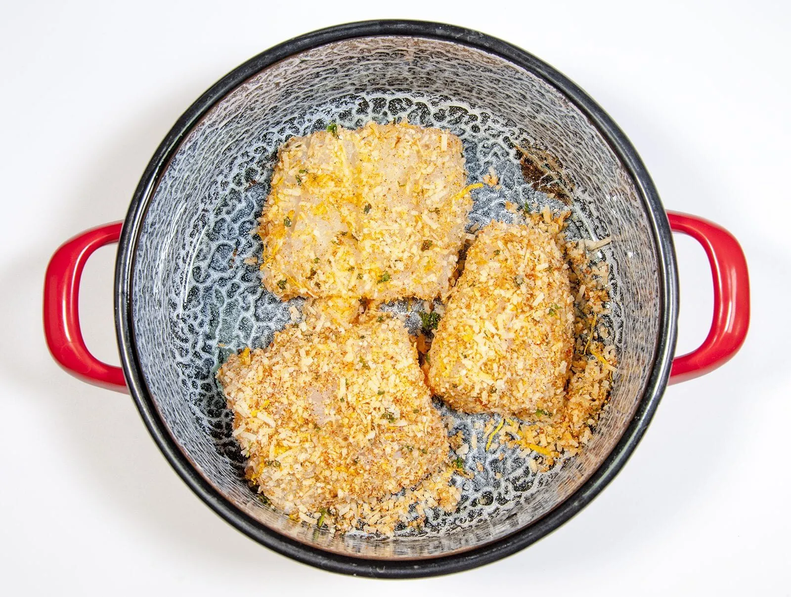 Parmesan & Paprika Haddock Baked in Garlic Butter. Place in roasting pot | https://theyumyumclub.com/2019/04/29/parmesan-paprika-haddock-garlic-butter/
