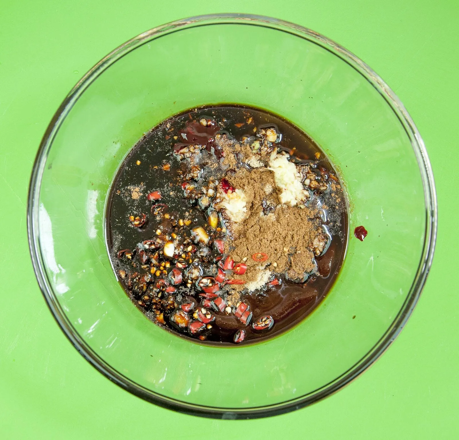 Add all the marinade ingredients to a bowl. Chinese sticky hoisin chilli ribs. Perfect pork spare rib. Yum! Yum! | theyumyumclub.com