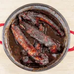 Slow-cook the ribs for 5-6 hours. Chinese sticky hoisin chilli ribs. Perfect pork spare rib. Yum! Yum! | theyumyumclub.com