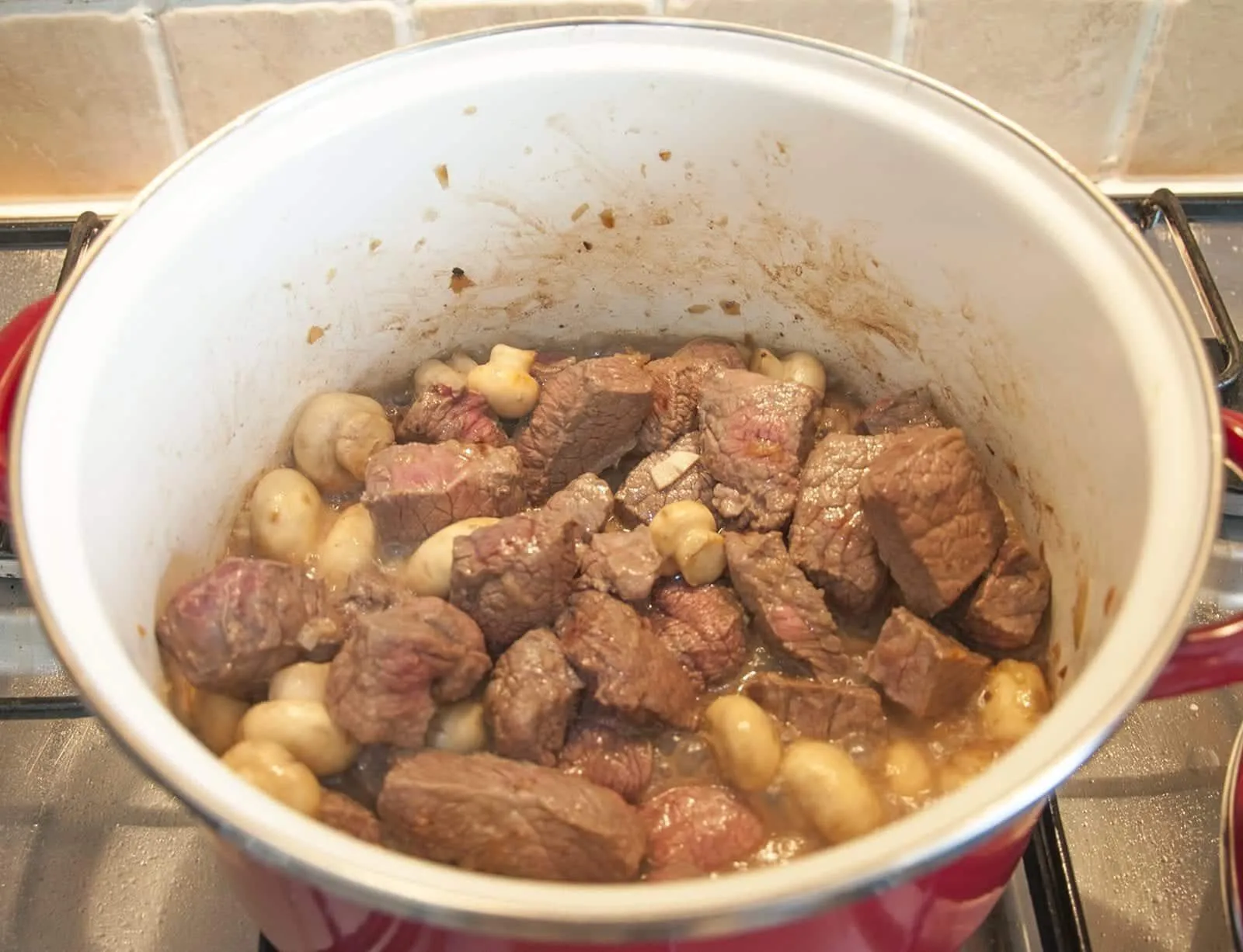 Braised beef rump in red wine. Brown off the diced steak | https://theyumyumclub.com/2019/05/08/braised-beef-rump-red-wine/