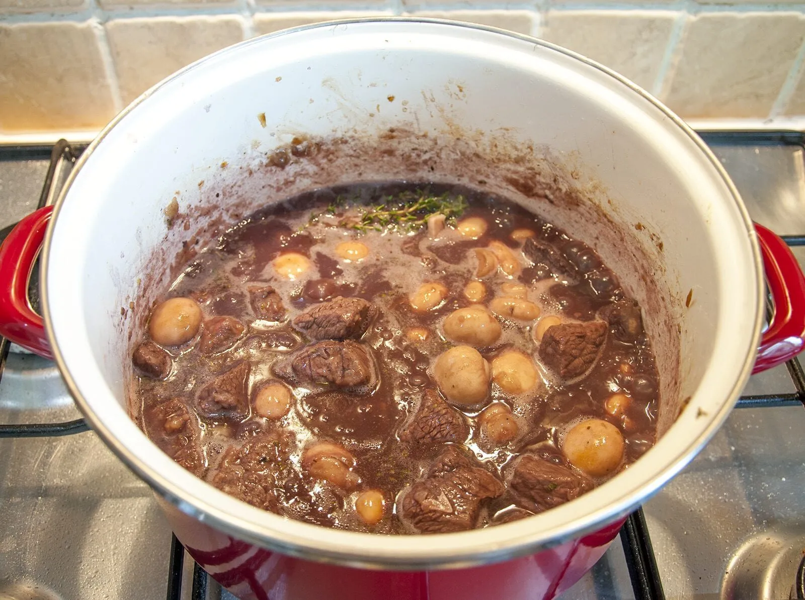 Braised beef rump in red wine. Reduce the wine by half | https://theyumyumclub.com/2019/05/08/braised-beef-rump-red-wine/